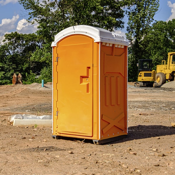 how often are the portable restrooms cleaned and serviced during a rental period in Cornwall